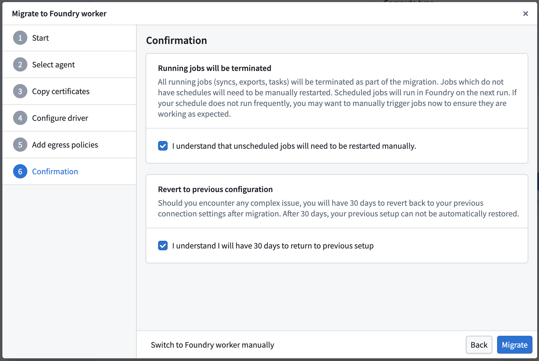 The confirmation step of the migration wizard showing job termination and revert acknowledgment checkboxes.